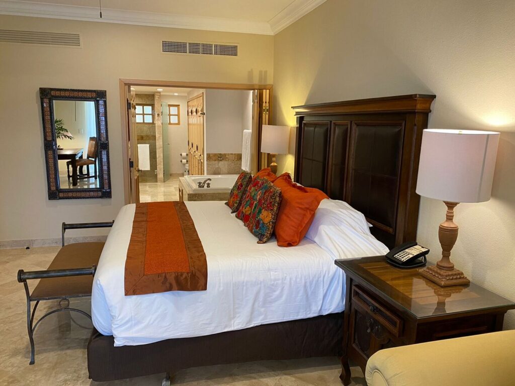 View of bedroom with an ensuite bath